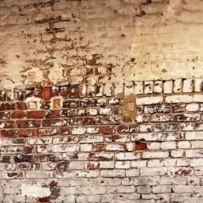 Mur de briques d'origine du garage Garuma